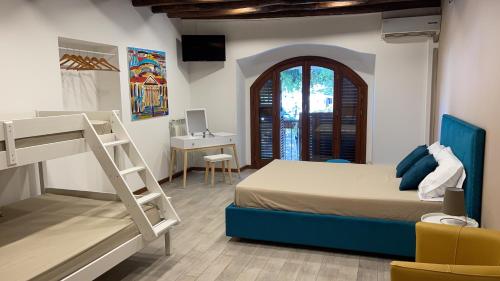 Postel nebo postele na pokoji v ubytování Posto al Capo