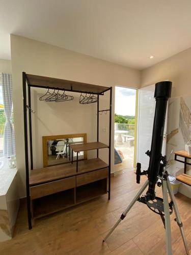 a large mirror in a room with a camera at Pousada Paraiso de Igaratá in Igaratá