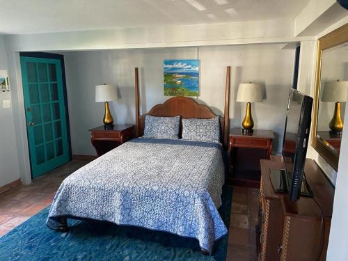 Un pat sau paturi într-o cameră la Aqua Saint Thomas