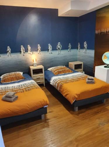 Ένα ή περισσότερα κρεβάτια σε δωμάτιο στο Chamonix Hyper centre . terrasse vue mont blanc . parking