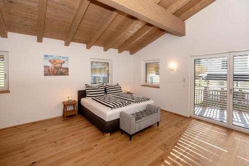 Postel nebo postele na pokoji v ubytování Ferienhaus Reiter Jochberg bei Kitzbühel