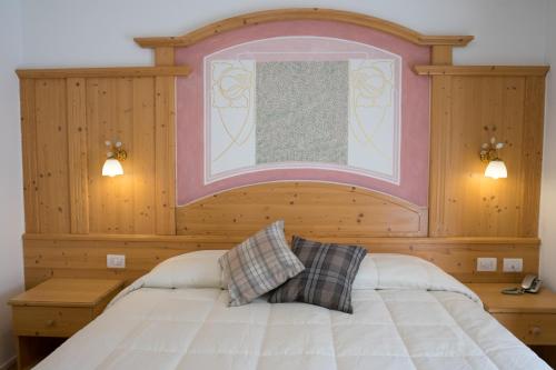 Una cama o camas en una habitación de Hotel San Valier