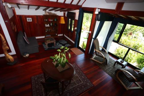 an overhead view of a living room with a table and chairs at Le Passe-Temps in Tha Lane Bay