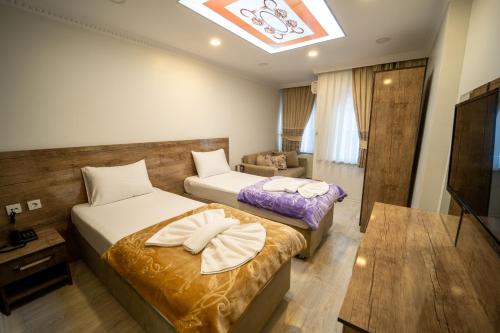 En eller flere senge i et værelse på Zin Hotel İstanbul