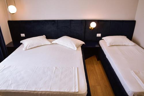 Postel nebo postele na pokoji v ubytování Hotel Jurgen