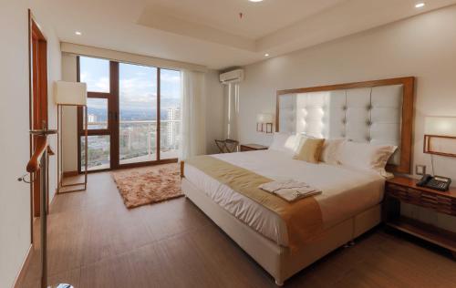 Postel nebo postele na pokoji v ubytování Hotel Vista Quince
