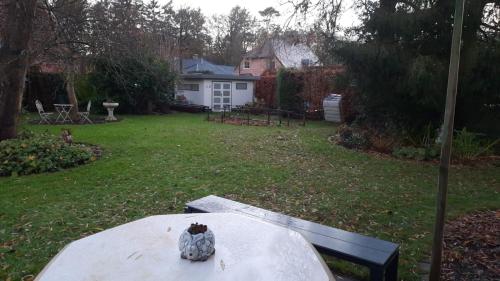 Un jardín fuera de B&B 't Gezellig Huizeke