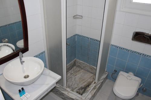 Ванна кімната в Herrmes Hospitality