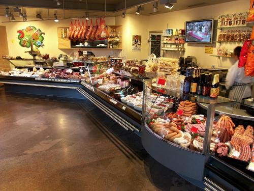 a bakery with many different types of food on display at Hotel Gasthof zum Ochsen in Arlesheim
