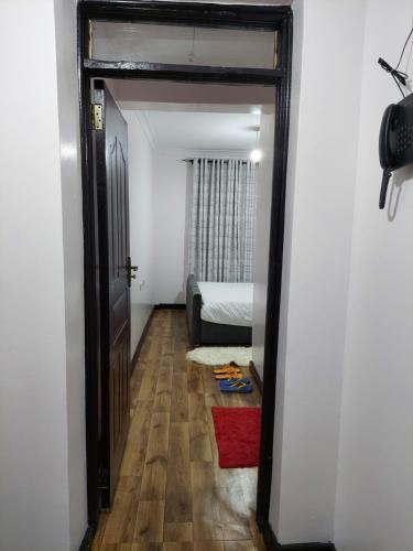 Postel nebo postele na pokoji v ubytování Emani Luxury Condo