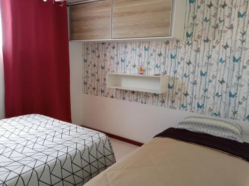 A bed or beds in a room at Flat 123 Bella Lunna