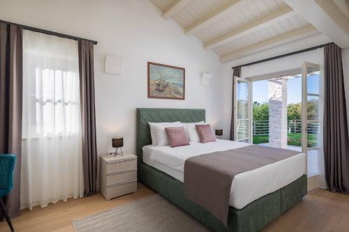 Katil atau katil-katil dalam bilik di Villa Celeste by ILC (Istria Luxury Collection)
