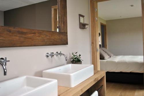 Postel nebo postele na pokoji v ubytování B&B Le Briquemont