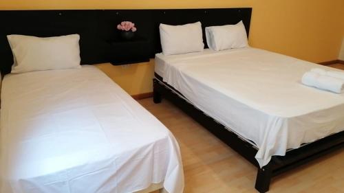 Cama o camas de una habitación en Bedrooms Buenos Aires