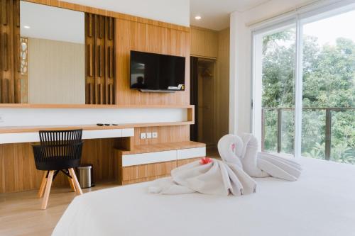 Un pat sau paturi într-o cameră la Melase Hill Villa