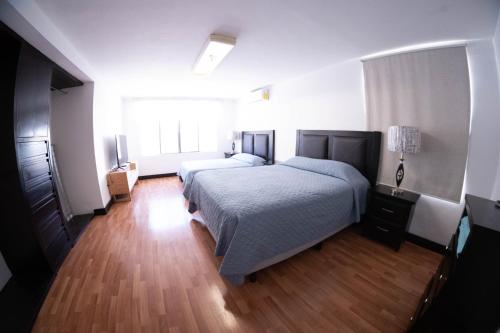Postel nebo postele na pokoji v ubytování 1, Apartment for 4 People - with Invoice