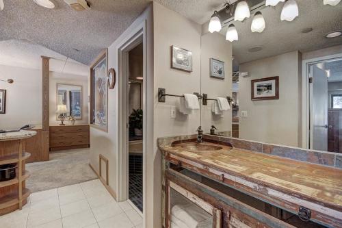 a large bathroom with a sink and a shower at Beaver Run 4308 in Breckenridge