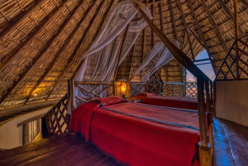 Ένα ή περισσότερα κρεβάτια σε δωμάτιο στο Hotel Punta Teonoste