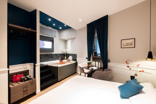 Postel nebo postele na pokoji v ubytování Navona Street Hotel