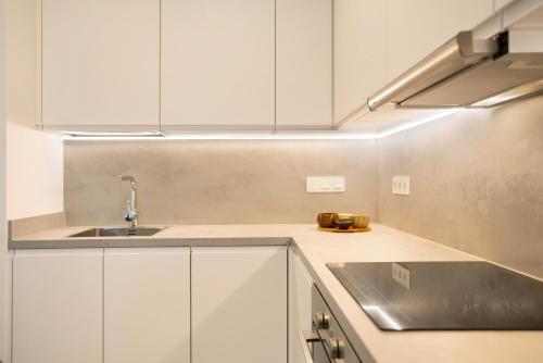 Kuchyň nebo kuchyňský kout v ubytování La Casita del Muelle