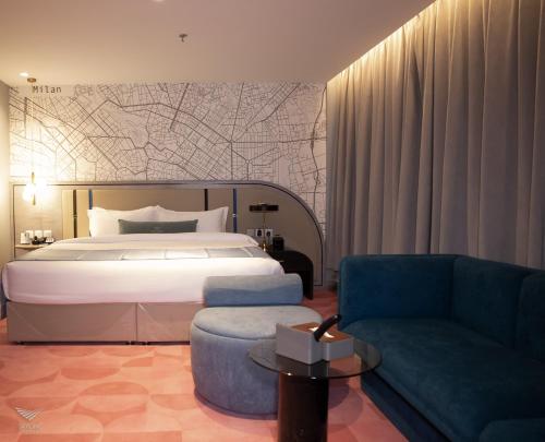Tempat tidur dalam kamar di Skyline Tabuk Hotel