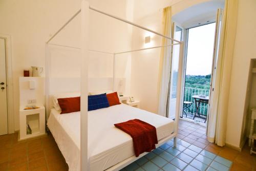 Voodi või voodid majutusasutuse Masseria Torrechiara Eco Dimora di Charme toas