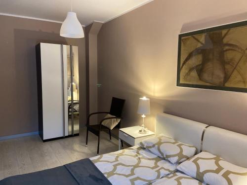 Posteľ alebo postele v izbe v ubytovaní Apartament Grafitowy Willa Laser