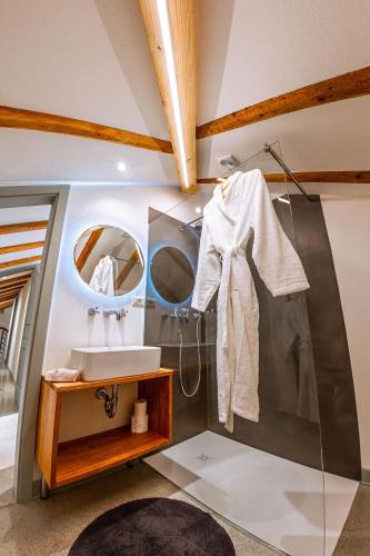 a bathroom with a sink and a mirror at Vila Brinovka in Kostanjevica na Krasu