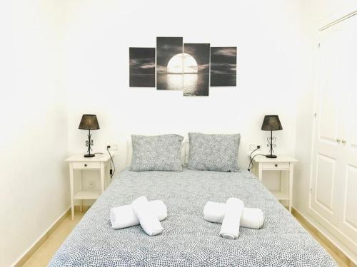 Posteľ alebo postele v izbe v ubytovaní Agua IV & seasonal pool by ELE Apartments