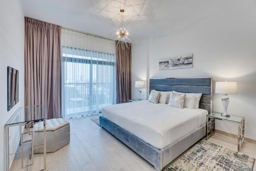 Postel nebo postele na pokoji v ubytování Luxury 2 BD apartment in Madinat Jumeirah Living
