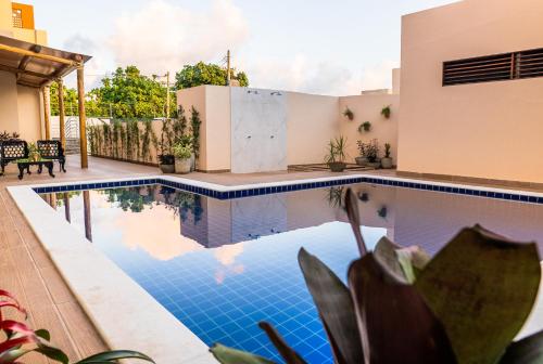 Bazén v ubytování Hotel Rochedo, Penedo - Alagoas nebo v jeho okolí