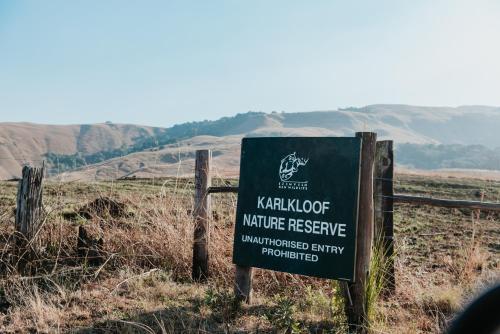 a sign for the kalkota nature reserve in a field at Rockwood Karkloof Forest Lodge & Mountain Cabin in Karkloof Nature Reserve