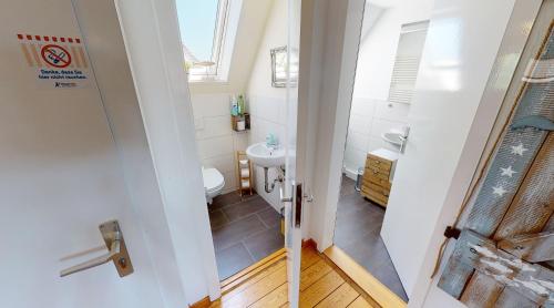 Ένα μπάνιο στο Ferienwohnung Nordlicht Laboe