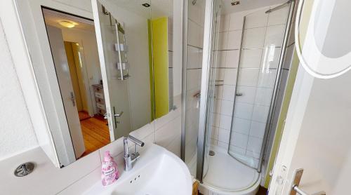 Ένα μπάνιο στο Ferienwohnung Nordlicht Laboe
