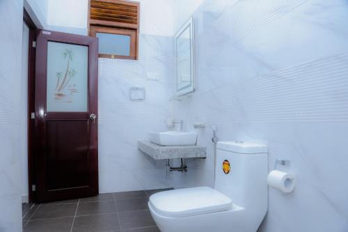 Koupelna v ubytování Shanora Beach