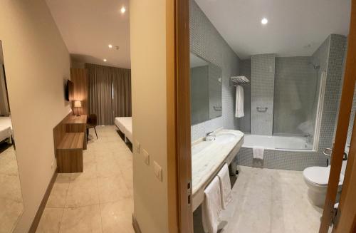 Koupelna v ubytování Hotel Camino Real