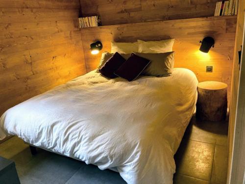 Postel nebo postele na pokoji v ubytování Chalet de la Marmotte à Valloire