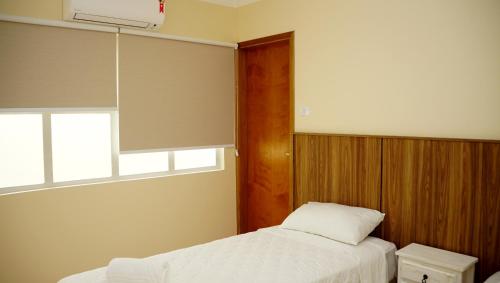 Katil atau katil-katil dalam bilik di Hotel Casa Ocarina - 850 metros São Paulo Expo