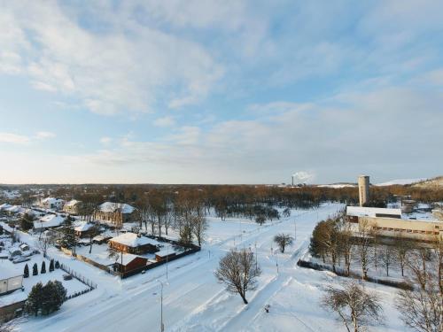 an aerial view of a town in the snow at Kotkapesa Apartment in Kiviõli