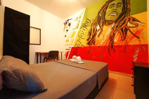 Ένα ή περισσότερα κρεβάτια σε δωμάτιο στο Casa Clandestina Guest House