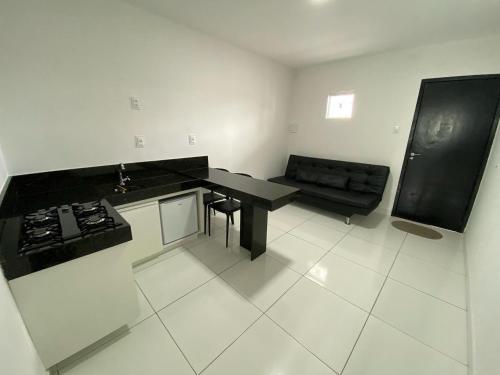 Η κουζίνα ή μικρή κουζίνα στο Flat Bugayalê