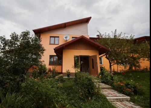 a small house with at Апартаменти "Захід сонця " in Slavske