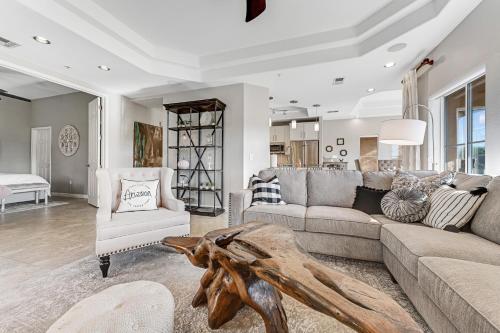a living room with a couch and a table at Golfer's Vista in Scottsdale