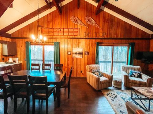 a dining room with a table and chairs at Mountain Top in Bessemer