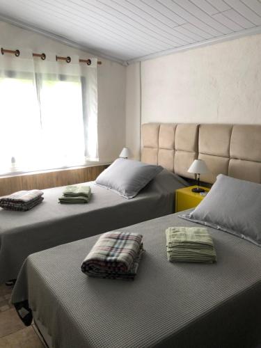 Llit o llits en una habitació de Vivenda dos Guaranys -Uma imersão na natureza - Casa
