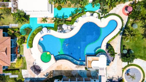 an overhead view of a pool at a resort at Seapine Beach Golf and Resort Hua Hin in Hua Hin