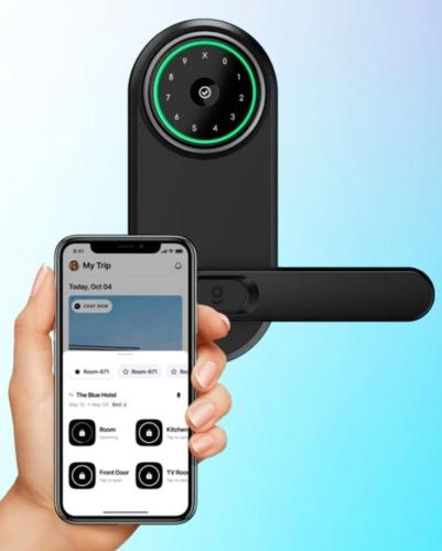 a hand holding a cell phone with a video camera at Bposhtels Las Vegas in Las Vegas