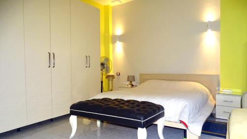 Säng eller sängar i ett rum på Central Apartments Shoshi