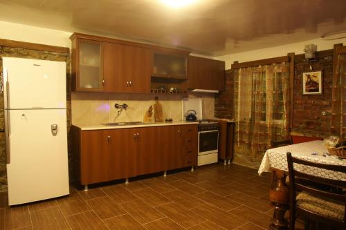 Kuchyň nebo kuchyňský kout v ubytování Sun Guest House