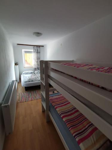 Postel nebo postele na pokoji v ubytování Apartma Jerman